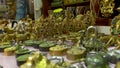 Collection of ancient bronze artefacts at a shop