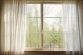 a wide open window with sheer curtains rustling in the breeze Royalty Free Stock Photo