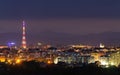 Wide panorama, aerial night view of modern tourist Ivano-Frankivsk city, Ukraine. Scene of bright lights of tall buildings, high Royalty Free Stock Photo