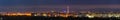Wide panorama, aerial night view of modern tourist Ivano-Frankivsk city, Ukraine. Scene of bright lights of tall buildings, high Royalty Free Stock Photo