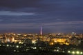 Wide panorama, aerial night view of modern tourist Ivano-Frankivsk city, Ukraine. Scene of bright lights of tall buildings, high Royalty Free Stock Photo