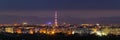 Wide panorama, aerial night view of modern tourist Ivano-Frankivsk city, Ukraine. Scene of bright lights of tall buildings, high t Royalty Free Stock Photo