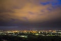 Wide panorama, aerial night view of modern tourist Ivano-Frankivsk city, Ukraine. Scene of bright lights of tall buildings, high t Royalty Free Stock Photo