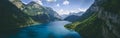 Wide panorama aerial view of deep blue mountain lake in swiss alps, klontalersee switzerland Royalty Free Stock Photo