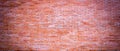 Wide panorama brick wall of red color banner