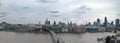 Wide panorama of the city of london along the thames showing the financial district skyscrapers and historic buildings Royalty Free Stock Photo