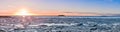 A wide panorama of the frozen ice field in a bay in Hofn, South East Iceland