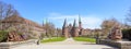 Wide panorama of the Lubeck Holstentor or Holsten gate park with two lion sculptures in front of the famous historic landmark, Royalty Free Stock Photo