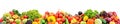 Wide panorama multi-colored fresh fruits and vegetables isolated on white Royalty Free Stock Photo
