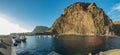 Wide panorama of Playa del ingles beach with volcanic black sand at the atlantic ocean in La Gomera. A popular vacation spot for Royalty Free Stock Photo