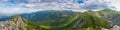 Wide panorama of the Polish High Tatras from mountain Giewont