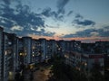 Wide panorama view of residential high-rise buildings in the evening at sunset Royalty Free Stock Photo