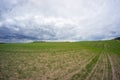 Wide panoramic agriculture cloudy landscape.
