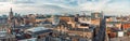 A wide panoramic looking out over old and new buildings and streets in Glasgow city centre. Scotland, United Kingdom