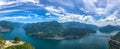 Spectacular panoramic view over the city of Lugano, the Lugano Lake and Swiss Alps from Monte San Salvatore mountain, Switzerland. Royalty Free Stock Photo