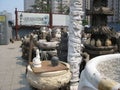 Wide photo of many stone statues - Panjiayuan Market