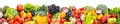 Wide photo of multi-colored fresh fruits and vegetables divided vertical lines isolated on white Royalty Free Stock Photo