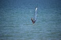 Wide photo of professional wind surfer practice on the sea wave with deep blue open turquoise sea. Azov sea, - July 25.2021 Royalty Free Stock Photo