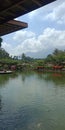 Wide Pond under Pretty Sky with Perfect-Shaped Clouds