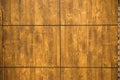 Wide rectangular wall tiles decorated with wood imitation