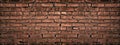 Wide red brick wall texture. Old rough brickwork. Retro grunge background Royalty Free Stock Photo