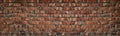 Wide Red Brick Wall Texture. Old Rough Orange Brickwork Widescreen Backdrop. Grunge Panoramic Large Background
