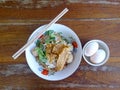 Wide rice noodle soup with vegetables and meat, egg Royalty Free Stock Photo