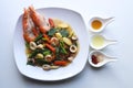 Wide Rice Noodles with Seafood in Gravy Sauce