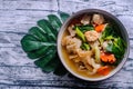 Wide Rice Noodles with Seafood and pork in Gravy Sauce, Asian food. Healthy and tasty menu. Royalty Free Stock Photo
