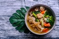 Wide Rice Noodles with Seafood and pork in Gravy Sauce, Asian food. Healthy and tasty menu. Royalty Free Stock Photo