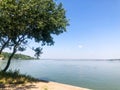 Wide river against clear blue sky Royalty Free Stock Photo