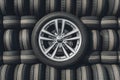Wide rubber wheel from auto, background of used tires photo Royalty Free Stock Photo