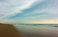 Wide sandy beach in Rimini and clouds Royalty Free Stock Photo