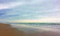 Wide sandy beach in Rimini and sky with clouds