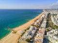 Wide sandy beach in touristic Quarteira and Vilamoura, Algarve,