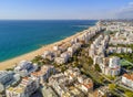 Wide sandy beach in touristic Quarteira and Vilamoura, Algarve,