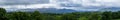 Wide scenic panorama of the Magnetron Mountain Group in Killarney National Park with the mountain tops in the clouds