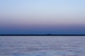 A wide seascape shoot with very well composed colors and black horizon from izmir bay - blue color dominated