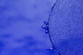 Wide semi circle full of tiny bubbles on the blue blurry background isolated Royalty Free Stock Photo