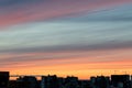 Wide shot of city and sunset that light up the sky show art creation as nature paint the sky and cloud with warm tone Royalty Free Stock Photo