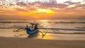 Wide shot of a fishing boat on kuta beach, bali Royalty Free Stock Photo