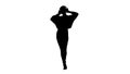 Silhouette Smiling female with headphones walking and dancing to Royalty Free Stock Photo