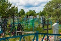 Graves and trees in Russian provincial Cemetery Royalty Free Stock Photo