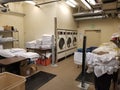 Wide shot of hotel laundry room