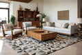 wide shot of a living room with teak furniture and geometric rug