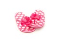 Wide shot of pink and white polka dot flip flops isolated on a white studio background Royalty Free Stock Photo