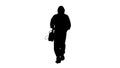 Silhouette Disinfectant walking with antiviral liquid tank looking to camera. Royalty Free Stock Photo