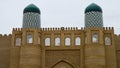 Two tiled towers in Xiva, Uzbekistan