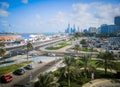 Wide shot view of Abu Dhabi city skyline and towers from the corniche street Royalty Free Stock Photo