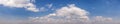 Wide sky panorama with scattered cumulus clouds Royalty Free Stock Photo